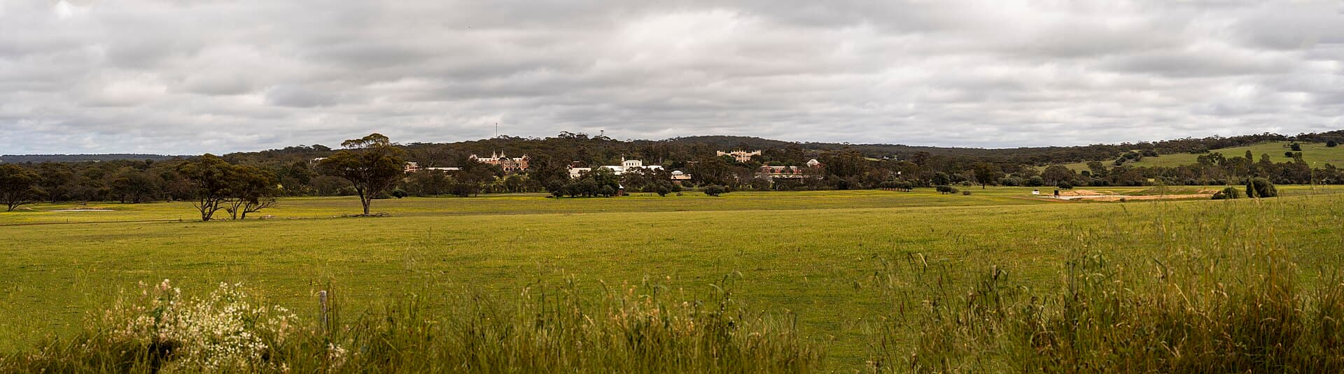 Wide scenic view of the New Norcia townsite, showcasing its unique monastic architecture.